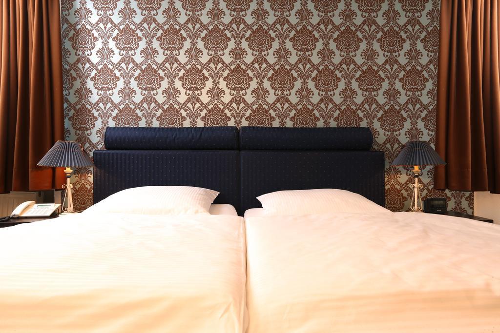 Hotel Amsterdam Hamburg-Harburg Rum bild